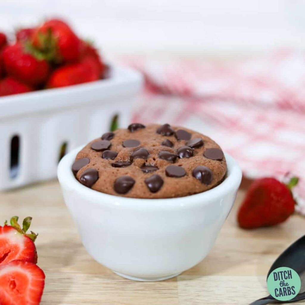 baked chocolate keto mug cake with sugar-free chocolate chips