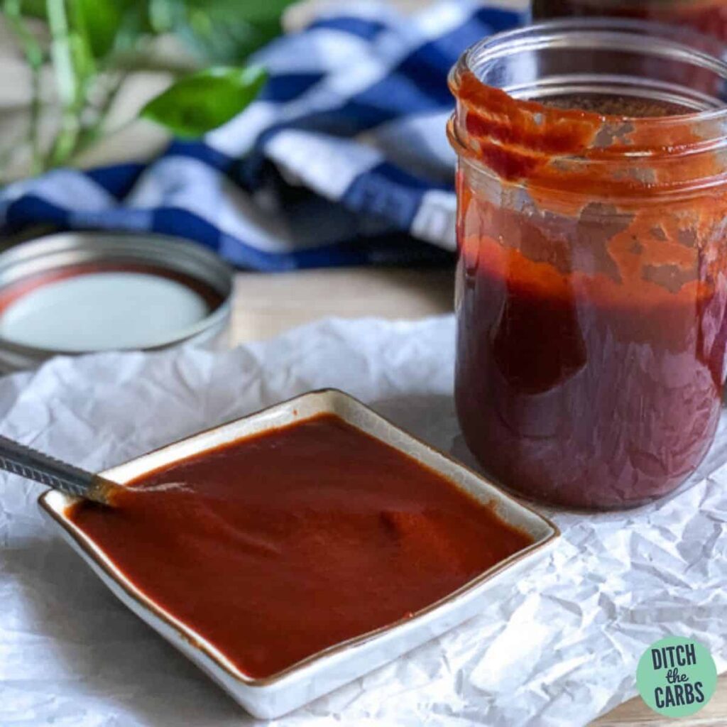 Close up of BBQ sauces dripping down a jar